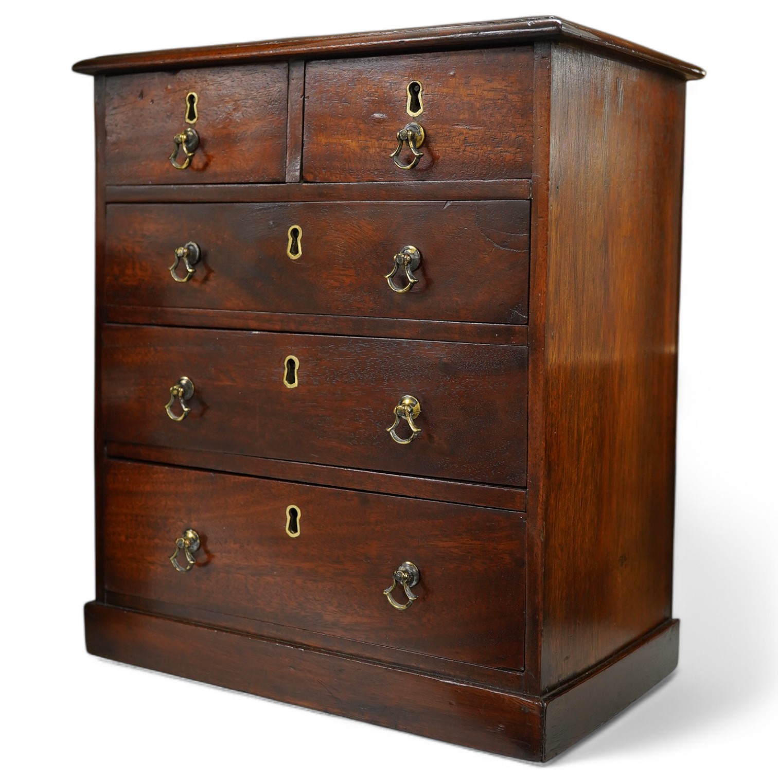 A George III style mahogany miniature chest of five drawers, 30cm high. Condition - fair/good